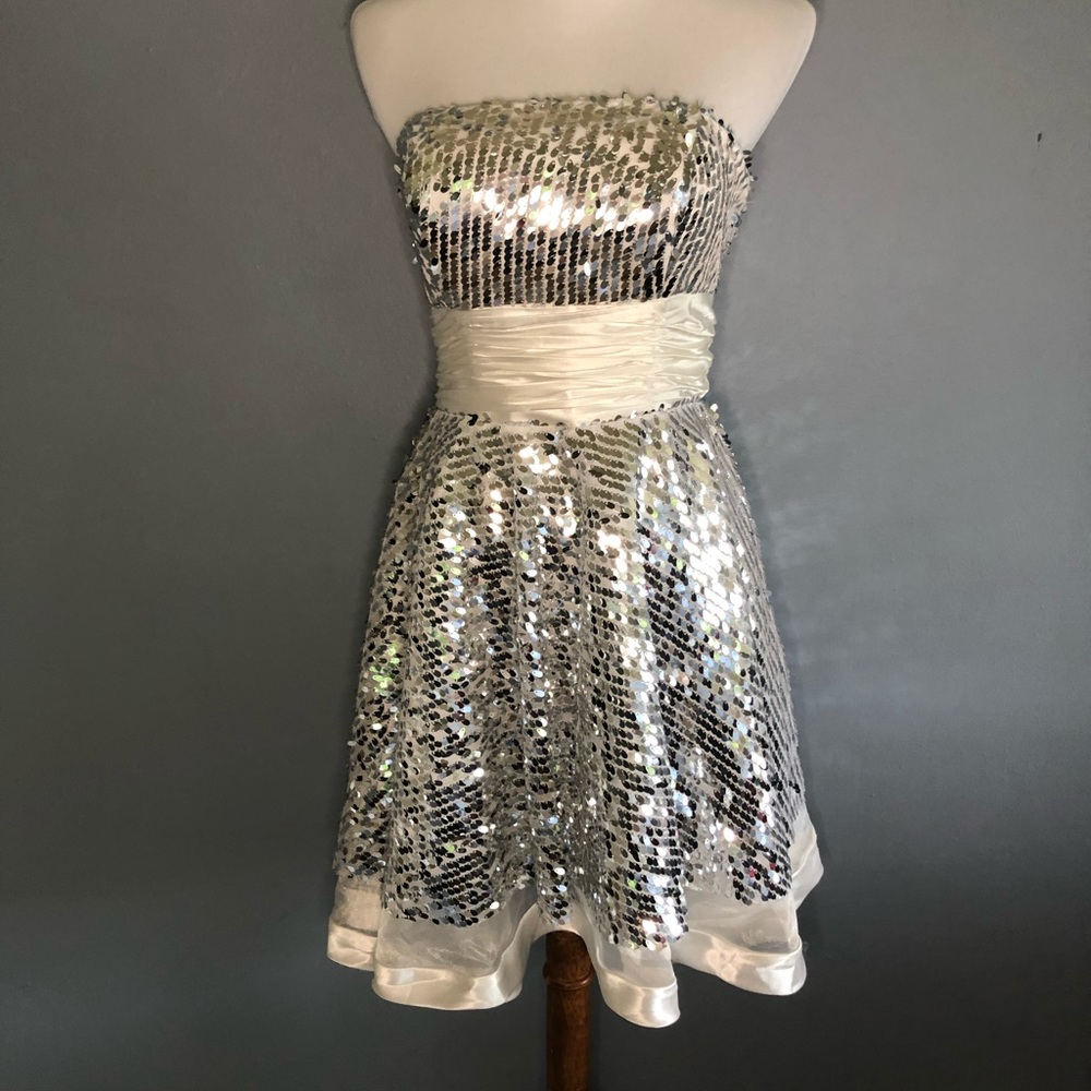 Sequin lace up dress.